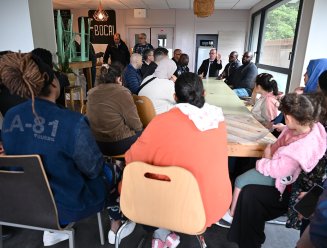 Réunion après l'incendie à la résidence Potier